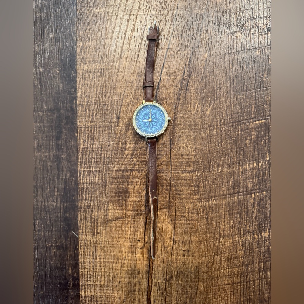 Francesca’s Brown Leather Strap Watch with Blue Dial and gold accents